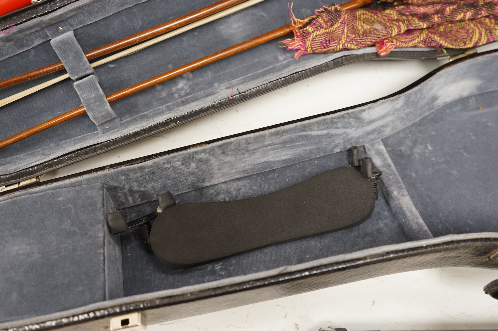 Three musical instruments to include a Buffet flute and violin with two bows